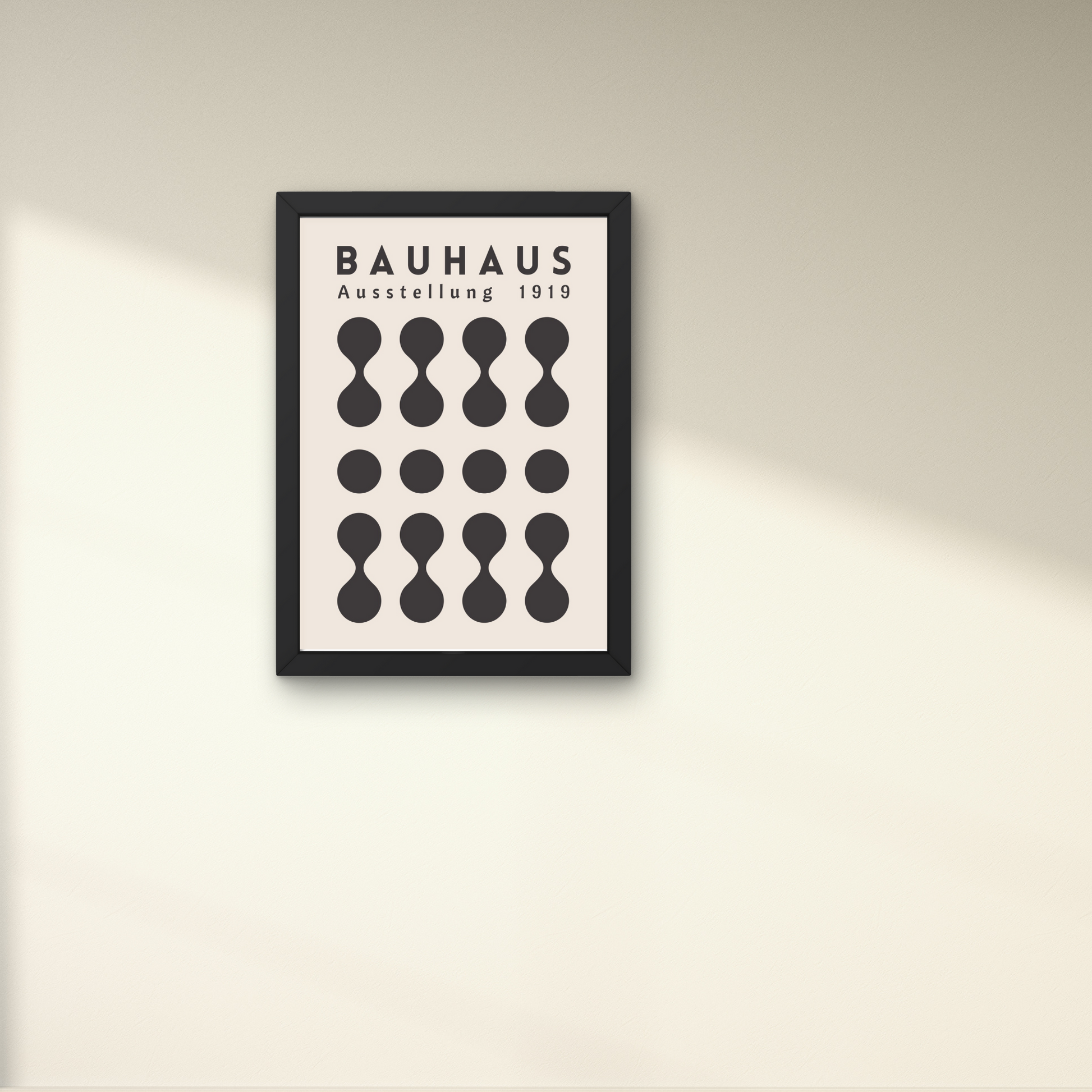 Minimalist Bauhaus exhibition poster in black and beige with abstract shapes, framed for modern wall decor.




