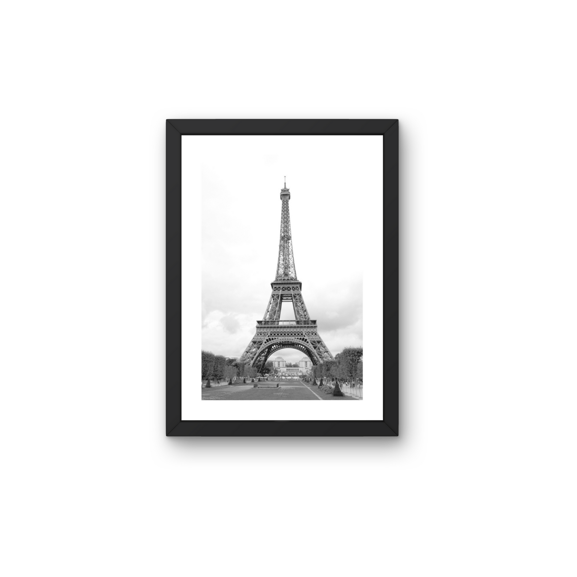 Classic black and white framed wall art of the Eiffel Tower, capturing its timeless elegance.



