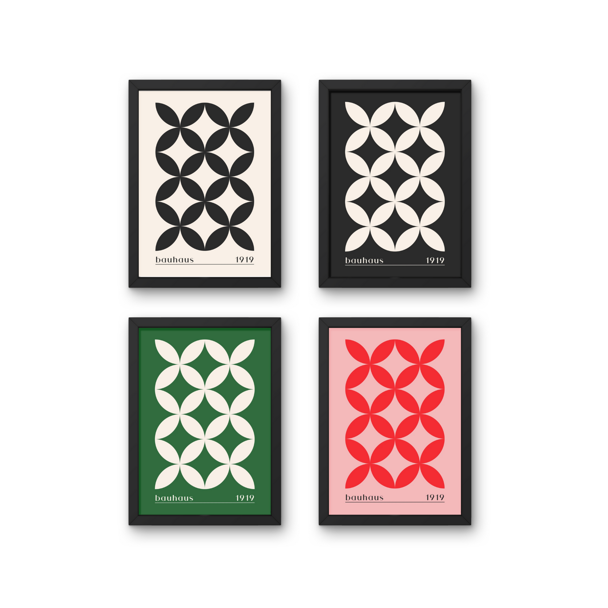 Set of four Bauhaus-inspired abstract geometric posters in black, white, green, and red, framed for modern wall decor.




