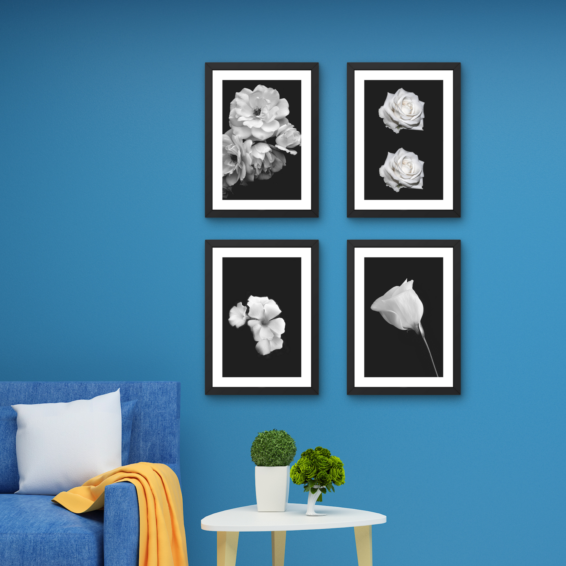 Set of four minimalist floral wall art pieces in black and white, ideal for home decor.



