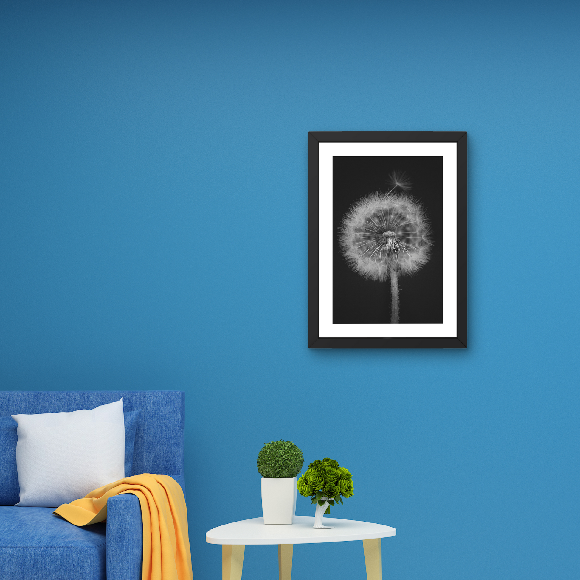 Detailed wall art of a dandelion in black and white, capturing its ephemeral beauty.




