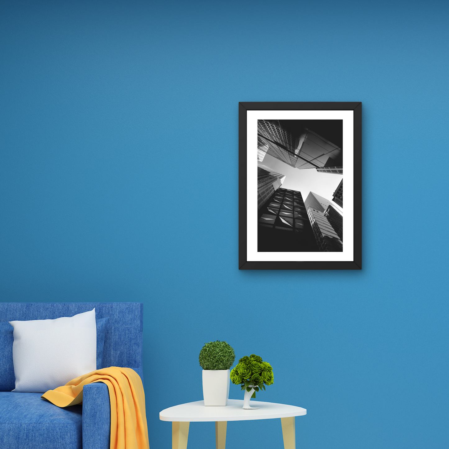 Framed modern wall art featuring a cityscape tapestry in black and white.



